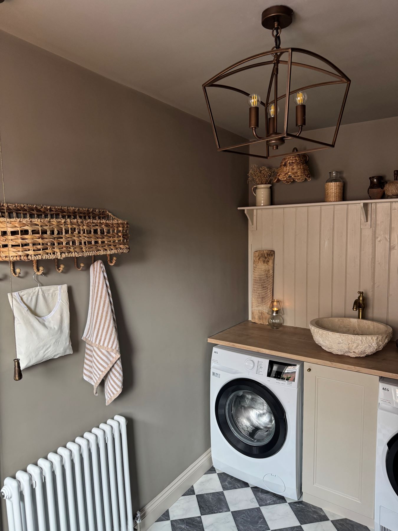 traditional utility room with black and white checkerboard floor